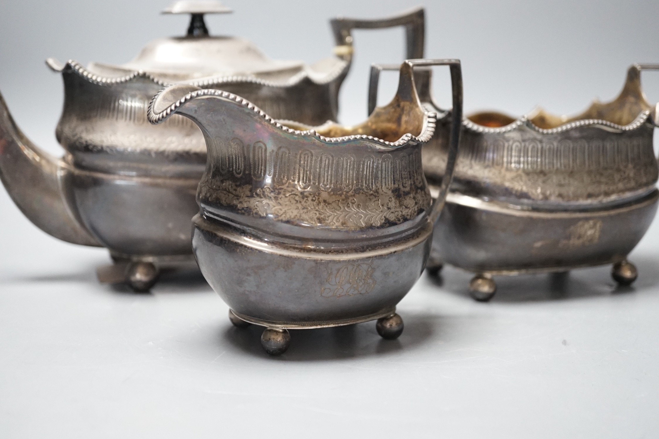 A George III Scottish silver three piece tea set, George McHattie, Edinburgh, 1809, 36.4oz.